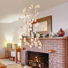 a living room with a fire place and lots of paper notes on the fireplace mantel