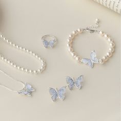 Enhance your outfit with our stunning Butterfly Pearl set. This versatile set includes a ring, bracelet, necklace, and earrings, each adorned with unique butterfly and pearl designs. Made with high-quality materials for a timeless and elegant look. Perfect for any occasion.
Necklace:

Pendant size:2*2cm

Weight about: 15g

Chain length: 40 CM (+ 5 cm adjustable chain)

Adjustable lobster clasp size - one size fits all

High quality zinc alloy

Hypoallergenic, lead and nickel free

Bracelet:

Nat Butterfly Necklace Aesthetic, Butterfly Chain, Butterfly Things, Jewellery Design, Stylish Jewelry Accessories, Neck Pieces Jewelry, Pretty Jewelry Necklaces, Crystal Jewelry Sets, Bff Necklaces