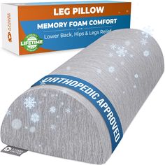 the memory foam comforter has snowflakes on it and is in front of a box