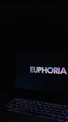 a laptop computer with the word euphoria lit up on it's screen