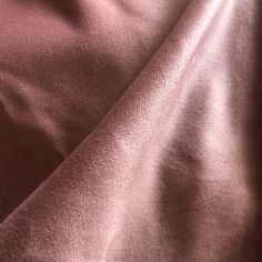 a close up view of a pink fabric