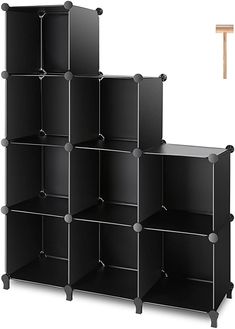 a black bookcase with six shelves on each side