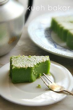 there is a piece of green cake on the plate