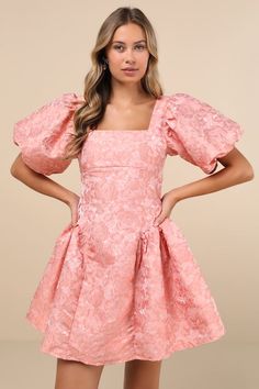 You'll be all sweetness in an adorably playful look like the Sister Jane Recital Pink Jacquard Floral Puff Sleeve Mini Dress! Lightweight woven fabric boasts a gorgeous floral jacquard design throughout as it shapes statement-making puff sleeves (with elastic at the cuffs) that frame a bodice with a square neckline and a low-cut back. Wide sashes tie at the back allow for a custom fit, atop a flaring skirt with trendy gathered side panels that lends a flirtatious finish. Hidden zipper at back. Fit: This garment fits true to size. Length: Mid-thigh. Size uk m/us 6 measures 33" from shoulder to hem. Bust: Great for any cup size. Waist: Fitted - very fitted at natural waist. Hip: Not Fitted - fuller skirt allows room for hips. Undergarments: May be worn with a strapless bra, adhesive bra, pet Pink Jacquard Summer Dress, Jacquard Mini Dress, Sister Jane, Puff Sleeve Mini Dress, Jacquard Design, Adhesive Bra, Floral Jacquard, Strapless Bra, Side Panels