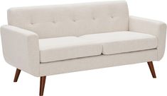 a white couch sitting on top of a wooden frame