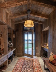 the interior of a house with wood paneling