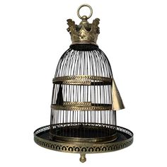 a golden birdcage with a crown on top