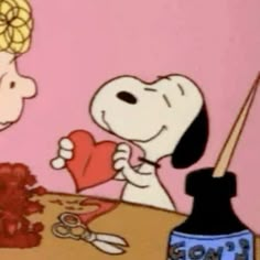 a cartoon dog is holding a heart in front of a woman with scissors and yarn