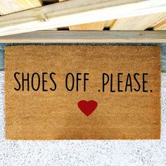 a door mat that says shoes off please with a red heart on the front and bottom