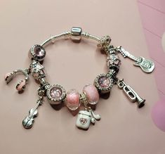 Pink  Charm Bracelet with Music, Music Bracelets for Women, Teens, and Girls. Bracelet for Musicians. Gift for Music Lovers. headphones, ear pods, guitar, trumpet, Snake Chain Bracelet with Pink Music Themed Charms, beautiful collection comes with a snake chain style charm bracelet. Pink Charm Bracelet, Coquette Collage, Ear Pods, Music Bracelet, Pandora Style Bracelet, Pink Music, Girls Bracelet, Pink Charm, Bracelet Pandora