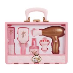 a pink suitcase with hairdryer and other items in it on a white background