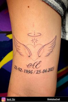 a woman's leg with a tattoo on it that reads, love and two doves