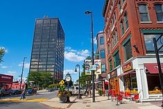 a city street filled with lots of tall buildings