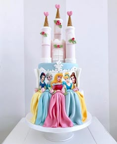 there is a cake that has princesses on it