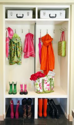 the closet is filled with shoes, bags and umbrellas for children's clothing