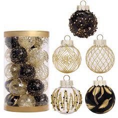 christmas ornaments in glass containers with gold trim