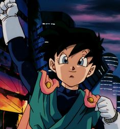 the young gohan is pointing at something in front of him