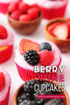 berry wine cupcakes with raspberries and blueberries in small bowls on the table