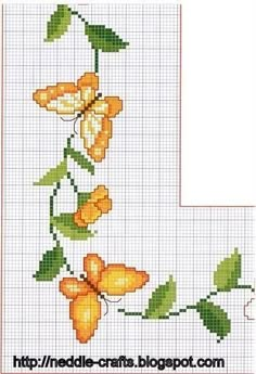 a cross stitch pattern with orange flowers and green leaves on the bottom half of it