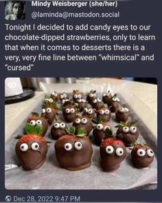 some chocolate covered strawberries with googly eyes on them are sitting on a table