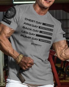 Gym Days Leg Day Funny Motivational Workout T-Shirt for Men, Lifting T-Shirt, Gym Gear, Gym Apparel, Workout Gift, Gift for Weightlifters, Gift for him Improve your gym workouts with our Gym Days Leg Day Funny T-Shirt for men. Made with very soft and lightweight fabric blend of 60% cotton and 40% poly, this t-shirt offers a comfortable and regular fit. Its manly fashion cut with side seams adds to its stylish look. This shirt makes a great gift for any man who loves working out. Gray Letter Print T-shirt For Gym, Crew Neck Muscle Tee With Letter Print For Workout, Gray Sweat-resistant Crew Neck T-shirt, Gray Crew Neck Sweat-resistant T-shirt, Gray Athletic Fit T-shirt For Gym, Gray Short Sleeve Activewear With Letter Print, Gray Sweat-resistant T-shirt For Gym, Leg Day Funny, Leg Day Humor