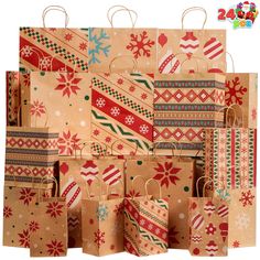 many bags are stacked on top of each other and decorated with snowflakes