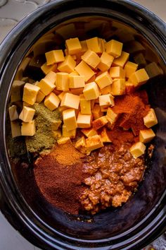 the ingredients to make this dish are in a crock pot and ready to be mixed together