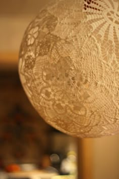 a close up of a light fixture in a room