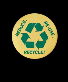 a yellow and green recycle button on a black background