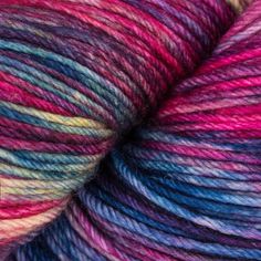 a skein of yarn with multicolored stripes