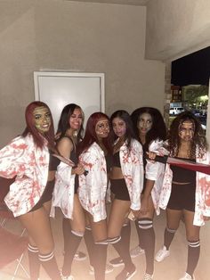 a group of women dressed in zombie costumes