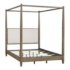 a metal bed frame with white sheets and pillows on it's headboard, against a white background