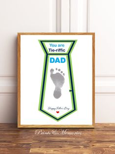 a fathers day card with a baby's footprints on it