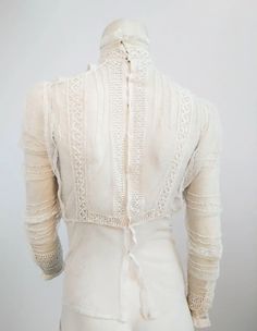 1900s White Lace Sheer Mesh Blouse For Sale at 1stDibs Elegant Cotton Lace Top With Lace Collar, Elegant Cotton Lace Top, Fitted Cotton Lace Blouse With Lace Trim, Elegant Cotton Lace Daywear Top, Elegant Cotton Lace Top With Lace Trim, Elegant Cotton Lace Top With Lace Work, Vintage Fitted Blouse With Lace Patchwork, Fitted Vintage Blouse With Lace Patchwork, Vintage White Fitted Lace Top