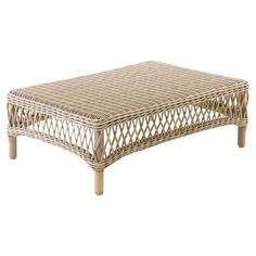 a wicker coffee table with wooden legs