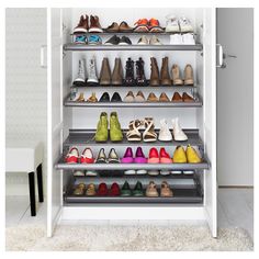 an organized closet filled with lots of shoes