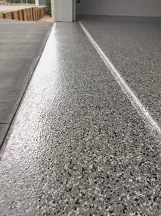 an empty parking garage with the door open