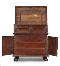 an old wooden dresser with two doors open on the top and one door closed at the bottom