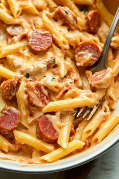 a pasta dish with pepperoni and sausage