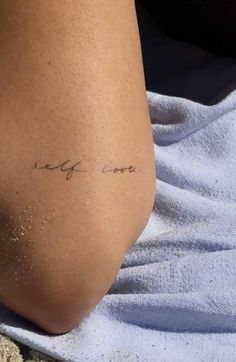 a woman's leg with writing on it that says, my life is love