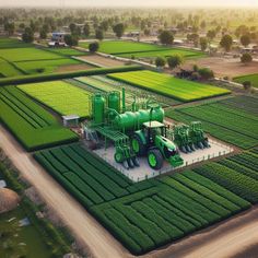 an aerial view of farm equipment in the middle of a field