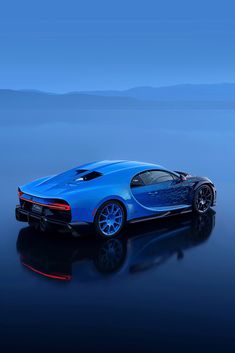 a bugatti type car is shown in the middle of a body of water