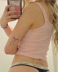 princess tattoo tramp stamp Dumbest Tattoos, Kpop Tattoos, Princess Tattoo, Pretty Hand Tattoos, Tattoo Skin, Bow Tattoo, Petite Tattoos, Discreet Tattoos