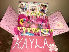 a pink birthday gift box with personalized items in it and the name kayla