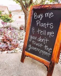 a sign that says buy me plants and tell me you don't trust the government