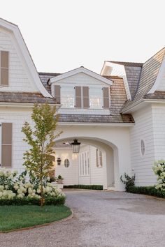 a large white house with lots of windows