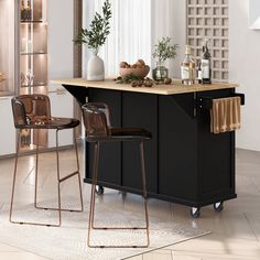 a kitchen island with two bar stools next to it