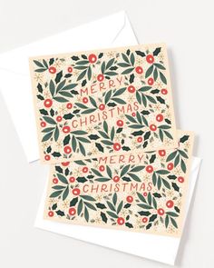 two christmas cards on top of each other with holly leaves and berries in the middle