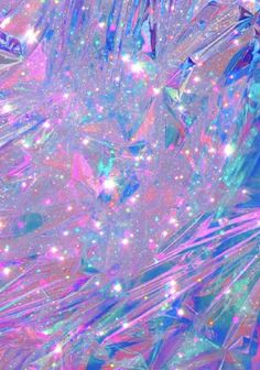 an abstract background with many colors and sparkles