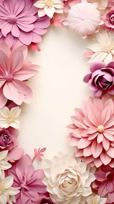 pink and white paper flowers arranged in a circle